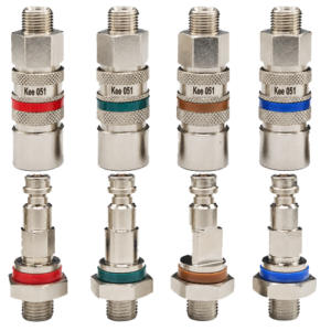 Set of four Kee 051 metal compression fittings with color-coded rings, arranged in two rows (red, teal, copper, blue).